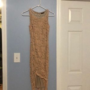 Lace light pink dress with a jeweled neckline